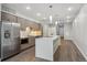 Modern kitchen with stainless steel appliances, granite countertops, and plenty of cabinet space at 3500 S Corona St # 409, Englewood, CO 80113