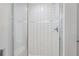 Modern shower with glass doors and white tile at 3500 S Corona St # 409, Englewood, CO 80113
