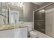 Bathroom featuring a granite vanity and glass bowl sink at 4152 Netherland St, Denver, CO 80249