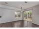 Open dining area with hardwood floors and a sliding door to the backyard at 4152 Netherland St, Denver, CO 80249
