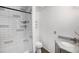 Bathroom featuring white subway tile, granite vanity, and modern fixtures at 8265 W 90Th Pl, Broomfield, CO 80021