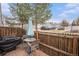 Outdoor patio with a grill, seating, and privacy fence, perfect for entertaining at 8265 W 90Th Pl, Broomfield, CO 80021