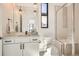 Modern bathroom featuring single vanity, granite countertop, decorative mirror and fixtures at 8648 Carneros Ct, Parker, CO 80138