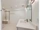 Sleek bathroom featuring a glass-enclosed shower and modern fixtures at 8648 Carneros Ct, Parker, CO 80138