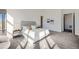 Primary bedroom with plush carpet, neutral decor, and ensuite bathroom at 8648 Carneros Ct, Parker, CO 80138