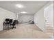 Large finished basement with plush carpeting and an open layout, ready for customization and various activities at 2251 Braun Dr, Golden, CO 80401