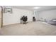 Spacious finished basement with neutral carpet, office area, and abundant space for recreation or relaxation at 2251 Braun Dr, Golden, CO 80401