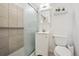 Functional bathroom with neutral tile, shower, and a simple vanity, providing a clean and organized space at 2251 Braun Dr, Golden, CO 80401