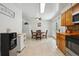 Bright dining area offers a backyard view and is conveniently located off the kitchen at 2251 Braun Dr, Golden, CO 80401