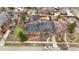 Aerial view showcasing the property's layout, landscaping, and neighborhood surroundings at 841 Niagara St, Denver, CO 80220