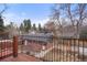 Inviting backyard featuring a well-maintained garden, mature trees, and a charming outdoor space perfect for relaxation at 841 Niagara St, Denver, CO 80220
