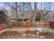 Fenced backyard with rock and mulch landscaping at 841 Niagara St, Denver, CO 80220