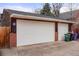 Two car garage and paved driveway at 841 Niagara St, Denver, CO 80220