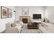 Neutral living room boasting ample seating, a stone fireplace, contemporary art, and a media center at 841 Niagara St, Denver, CO 80220