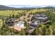 Aerial view of the property showcasing the pool and surrounding landscape at 25350 Ridge Way, Golden, CO 80401