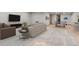 Spacious staged basement with large-screen television, modern furnishings, and a recreation area at 25350 Ridge Way, Golden, CO 80401
