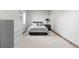 Comfortable bedroom with soft carpeting, a queen bed, and a sleek nightstand at 25350 Ridge Way, Golden, CO 80401
