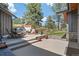 Outdoor patio featuring comfortable seating and beautiful views of the surrounding landscape at 25350 Ridge Way, Golden, CO 80401