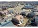 Overhead view showcases a property surrounded by residential homes, roads, and a school in a suburban neighborhood at 1665 Avery Way, Castle Rock, CO 80109