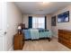 Inviting bedroom with natural light, carpet flooring, and a wooden dresser at 1665 Avery Way, Castle Rock, CO 80109