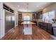 Spacious kitchen featuring stainless steel appliances, granite countertops, and ample cabinet space at 1665 Avery Way, Castle Rock, CO 80109