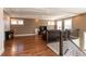 Spacious living room with hardwood floors, recessed lighting, and a cozy seating area at 1665 Avery Way, Castle Rock, CO 80109