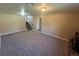 Spacious finished basement featuring a staircase and ample room for recreation and storage at 7021 Saulsbury St, Arvada, CO 80003