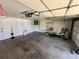 Clean and organized garage with ample storage space and an automatic door opener at 7021 Saulsbury St, Arvada, CO 80003