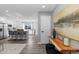 Modern entryway with console table and view into updated kitchen at 3520 W 95Th Ave, Westminster, CO 80031