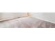 Spacious carpeted bedroom with neutral walls and trim, ready for your personal touch at 1399 Orchard St, Brighton, CO 80601