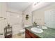 Traditional bathroom features a bath tub, shower, and a single sink vanity at 23662 E Alabama Dr, Aurora, CO 80018