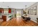 Bright dining area with a sliding glass door to the backyard and an open layout to the kitchen at 23662 E Alabama Dr, Aurora, CO 80018