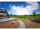 Beautiful backyard with a walkway, garden, and views of the surrounding landscape at 2515 Clayton Cir, Superior, CO 80027