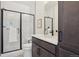 Modern bathroom with a glass-enclosed shower and a vanity with sleek fixtures at 2515 Clayton Cir, Superior, CO 80027
