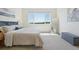 Bright bedroom with a comfortable bed, with a large window at 2515 Clayton Cir, Superior, CO 80027