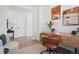 Bright home office with a rustic wood desk and modern decor at 2515 Clayton Cir, Superior, CO 80027