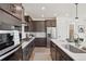 Gourmet kitchen with stainless appliances, expansive counters and stylish cabinetry at 2515 Clayton Cir, Superior, CO 80027