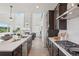 Spacious open concept kitchen with an island and views into the living room at 2515 Clayton Cir, Superior, CO 80027