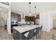 Modern kitchen features an island with pendant lighting and stainless steel appliances at 2515 Clayton Cir, Superior, CO 80027