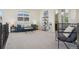 Upstairs living area with a blue couch, natural light, and modern decor at 2515 Clayton Cir, Superior, CO 80027