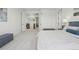 Spacious primary bedroom featuring stairs and a door to the bathroom at 2515 Clayton Cir, Superior, CO 80027