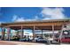 Outdoor shopping area with covered walkways, storefronts, and parking spaces at 2515 Clayton Cir, Superior, CO 80027