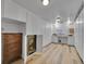 Spacious basement with ample storage, workbench area, and durable wood-look flooring at 595 W Lake Ave, Littleton, CO 80120
