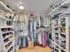 Walk-in closet with shelving and ample storage space for clothes and shoes at 595 W Lake Ave, Littleton, CO 80120