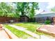 Lush backyard featuring a shed, patio, and well-maintained lawn at 2507 9Th St, Boulder, CO 80304