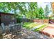 Inviting backyard with patio, dining set, and well-manicured lawn at 2507 9Th St, Boulder, CO 80304