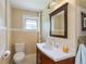 Cozy bathroom with modern sink, vanity, toilet, and neutral color palette at 2507 9Th St, Boulder, CO 80304