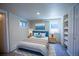 Cozy bedroom with blue accents, soft lighting, and built-in shelving at 2507 9Th St, Boulder, CO 80304
