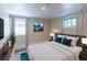 Bedroom featuring a window, white curtains and a mountain painting on the wall at 2507 9Th St, Boulder, CO 80304