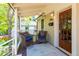 Inviting front porch with seating, rug, and a warm, welcoming entrance at 2507 9Th St, Boulder, CO 80304